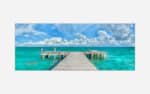 A vibrant art piece featuring a wooden pier extending into the turquoise waters of a tropical ocean with fluffy clouds in the sky.