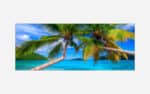 A vibrant art photograph of two coconut palm trees leaning over a serene tropical beach with clear blue water and a distant island under a bright blue sky.